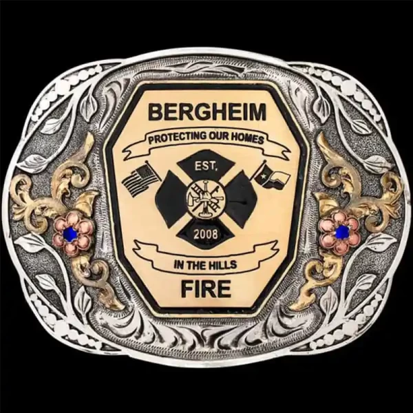 " The buckle honors the brave, yet it’s designed for any occasion—customize it your way! Our Bergheim Belt Buckle is handcrafted on a German Silver base, featuring a striking three-tone metal design. This buckle showcases a bold, central emblem displ